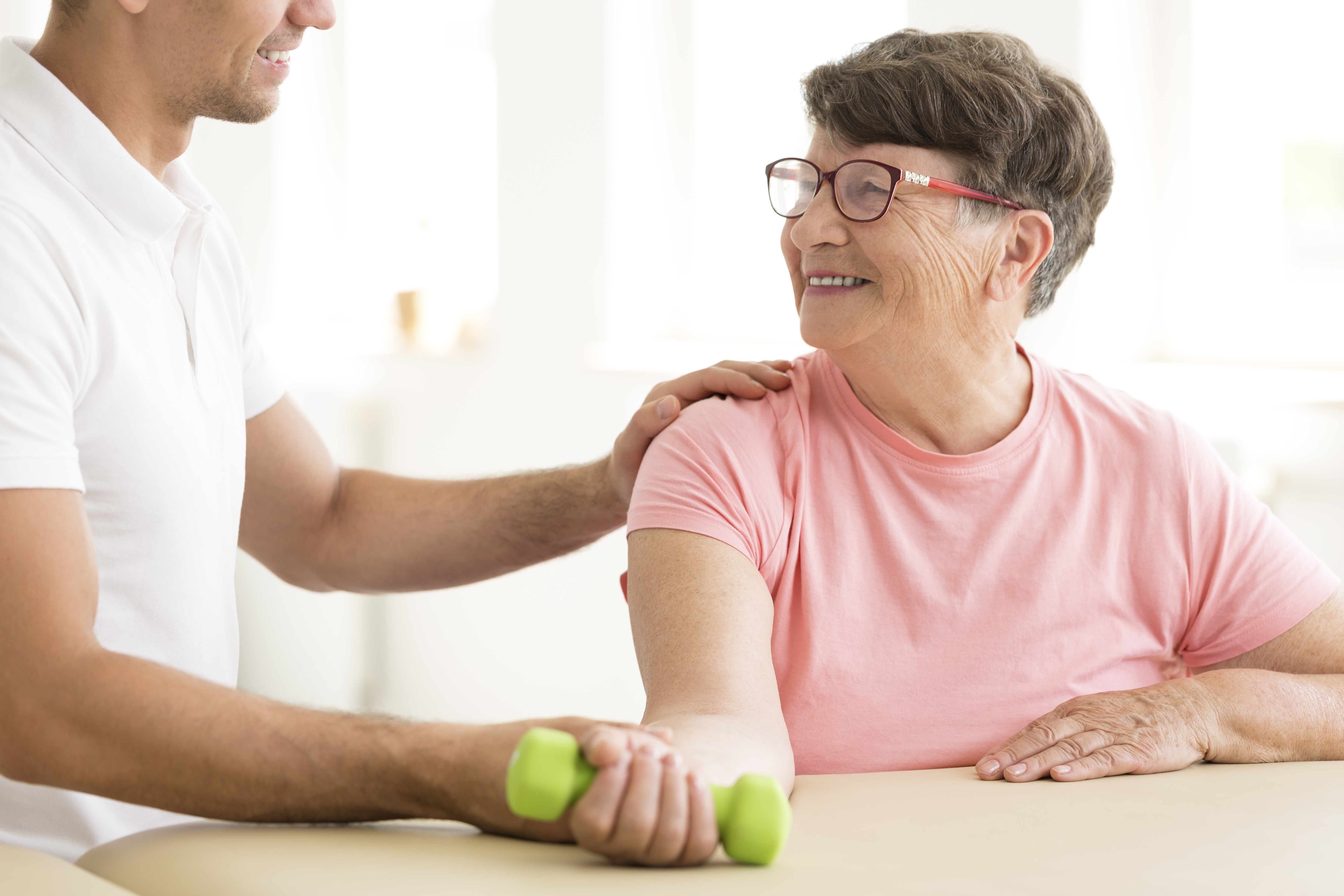 Older woman in physical rehabilitation Neurologische Physiotherapie